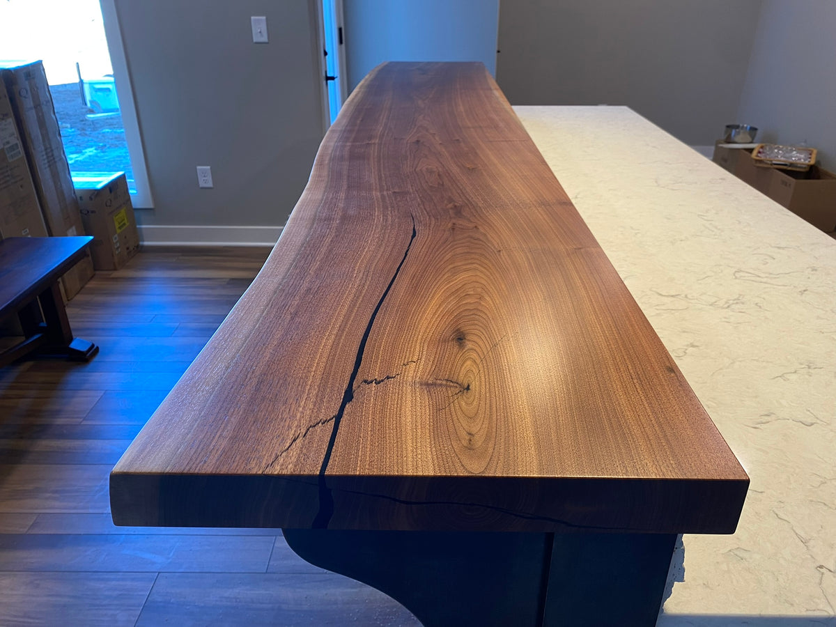 https://www.kccustomhardwoods.com/cdn/shop/files/Liveedgewalnutbartop3_1200x.jpg?v=1698587191