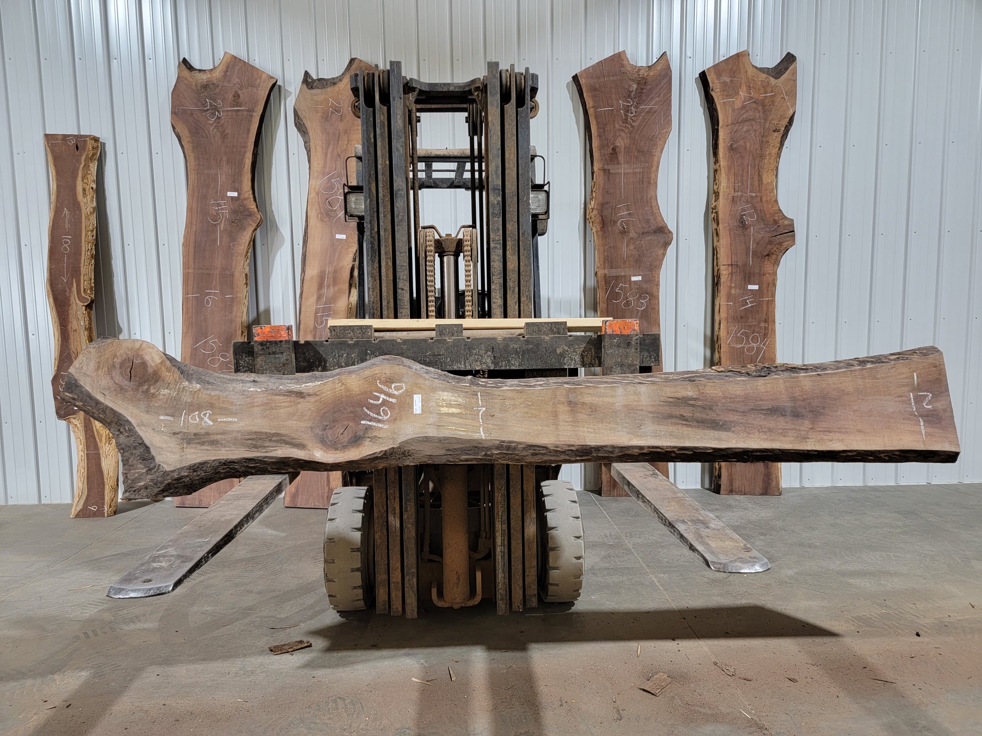 Black Walnut (1646) 108” L X 7-12” W X 1.75” T